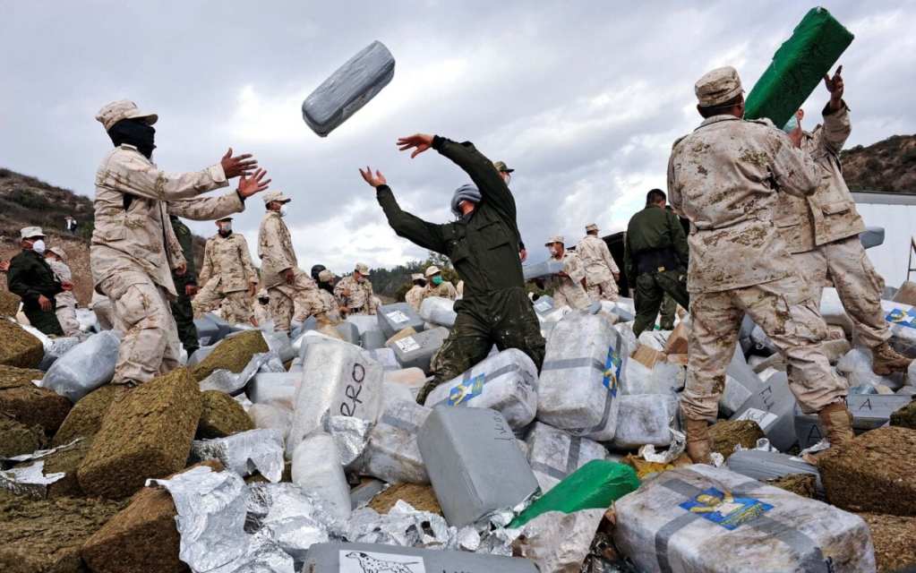 Soldiers processing confiscated drugs