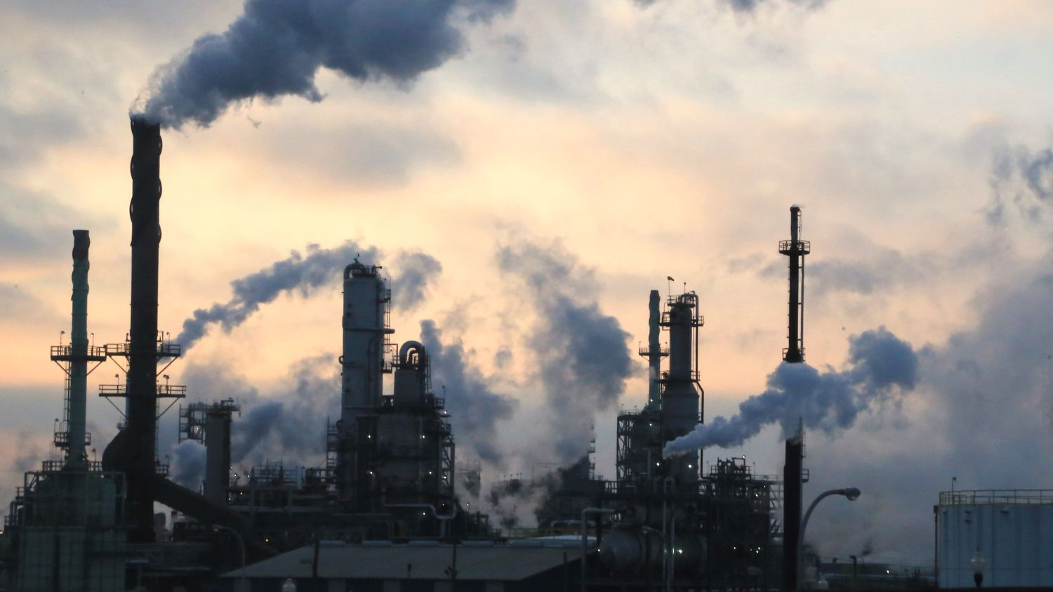 Billowing power plant smokestacks