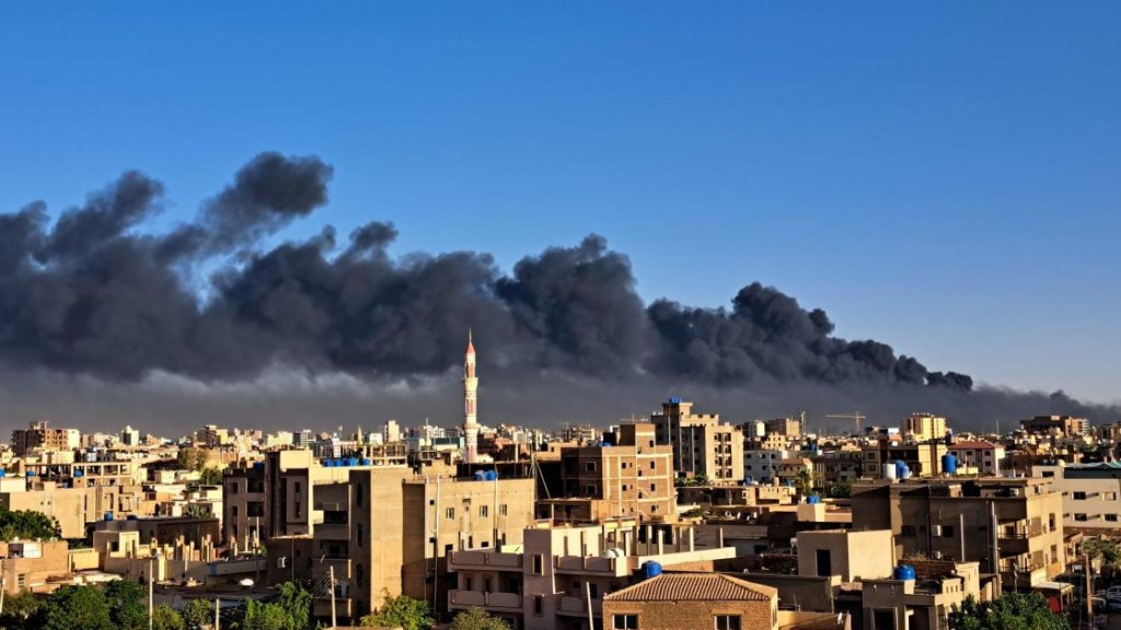 Smoke rising above Khartoum as fighting rages below